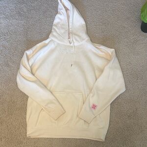 Glossier Cream Hoodie with Pink Accent